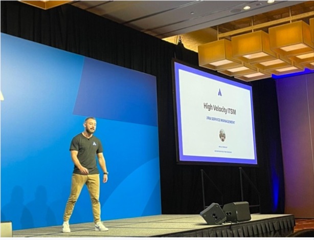Phil Bradley on stage at Atlassian's High Velocity ITSM keynote